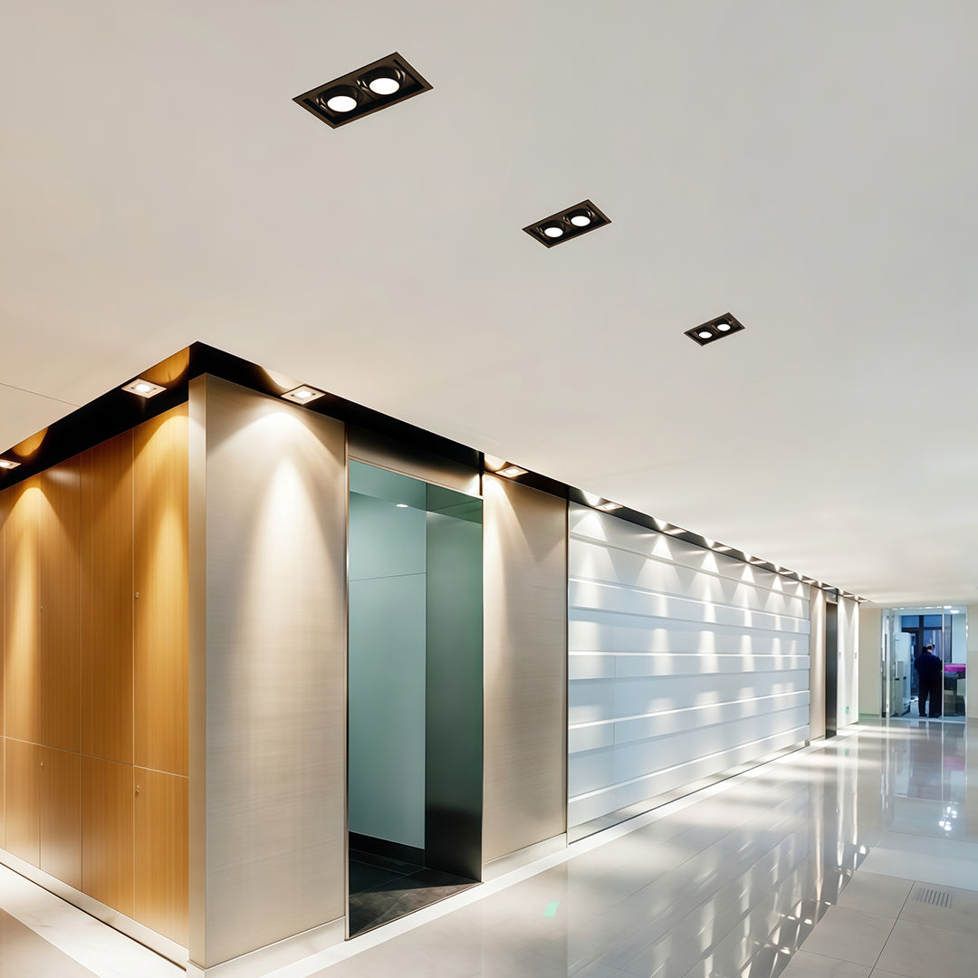 Elegant LED indoor spotlight with glass shade chandelier influence providing ambient illumination in sophisticated living space.