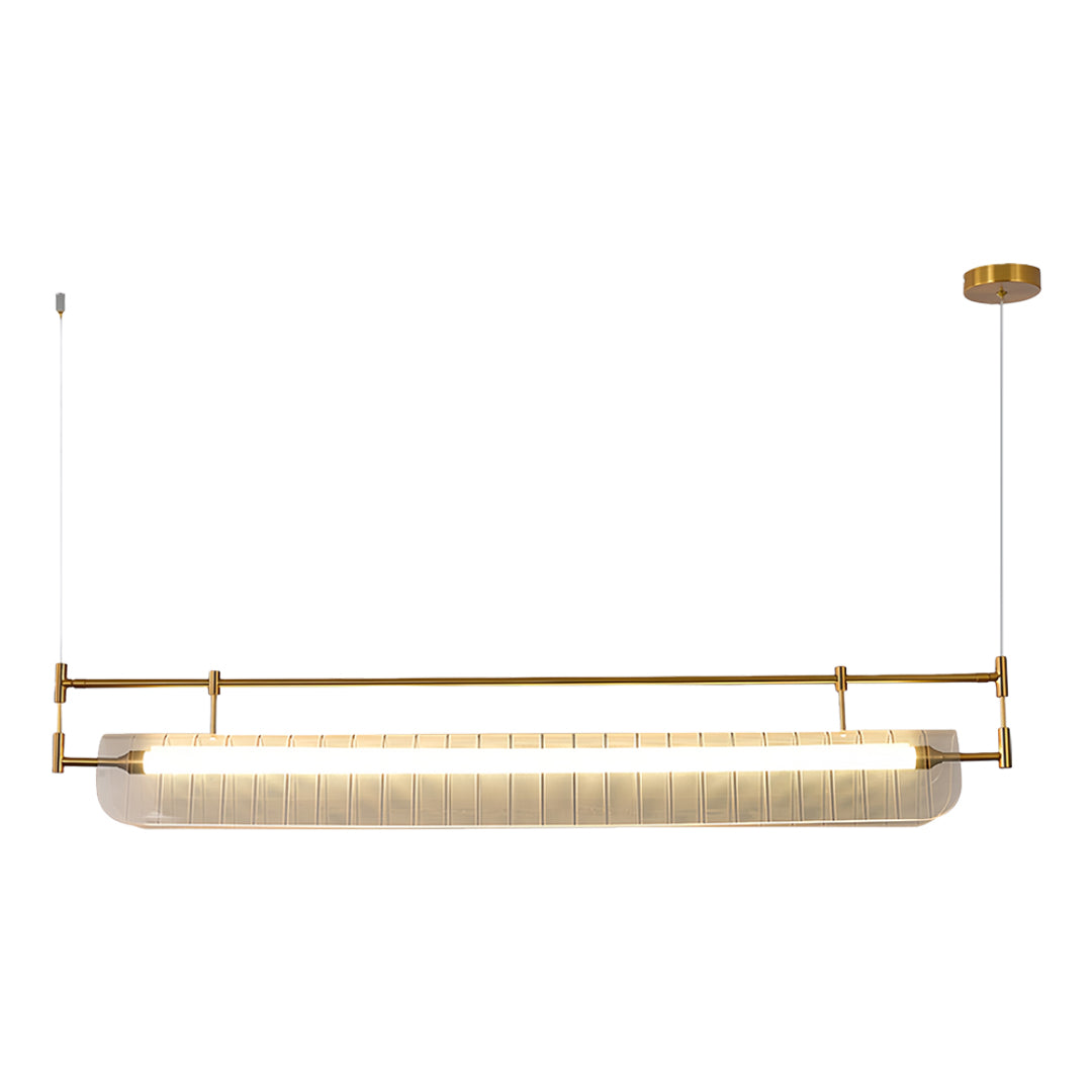 Elegant linear light pendant with textured crystal-like shade in gold and beige tones on white