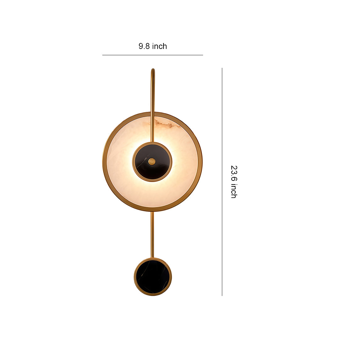 Elegant marble wall light with circular golden ring design and suspended black sphere accent