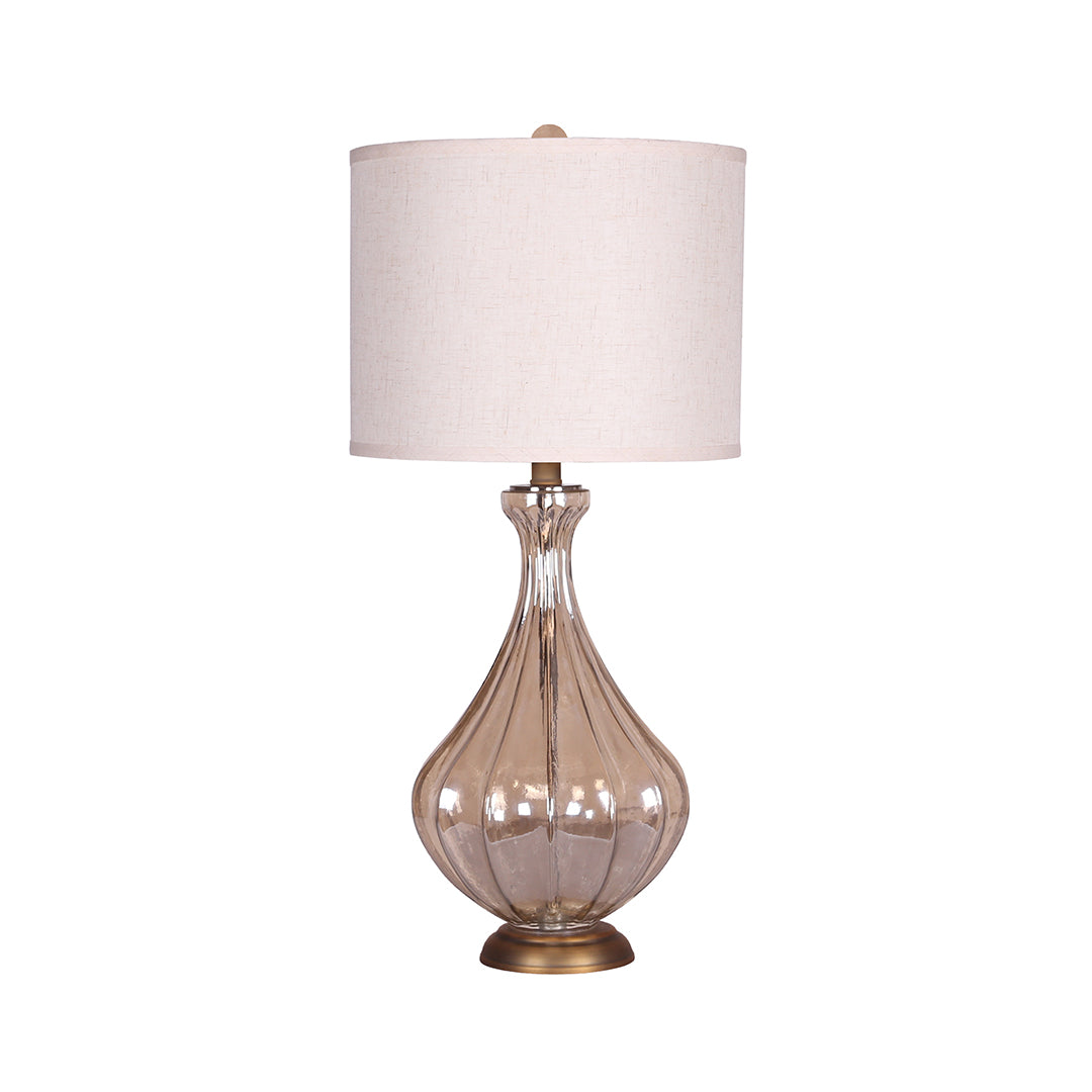 Elegant glass base table lamp with a textured, metallic mercury glass finish and a tapered white linen drum shade.