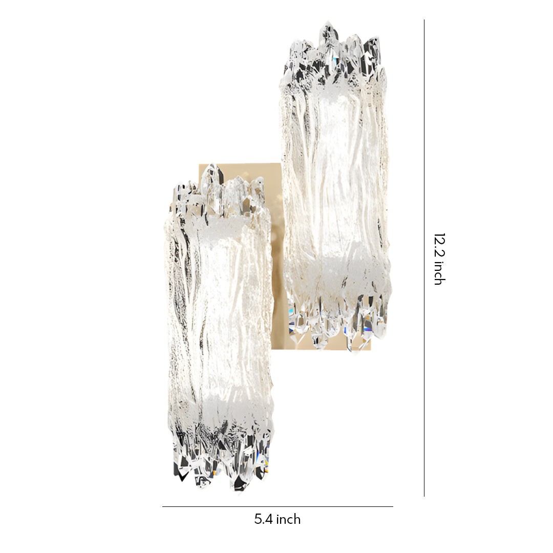 Elegant modern wall lighting with elongated textured glass shade and circular brass mounting plate