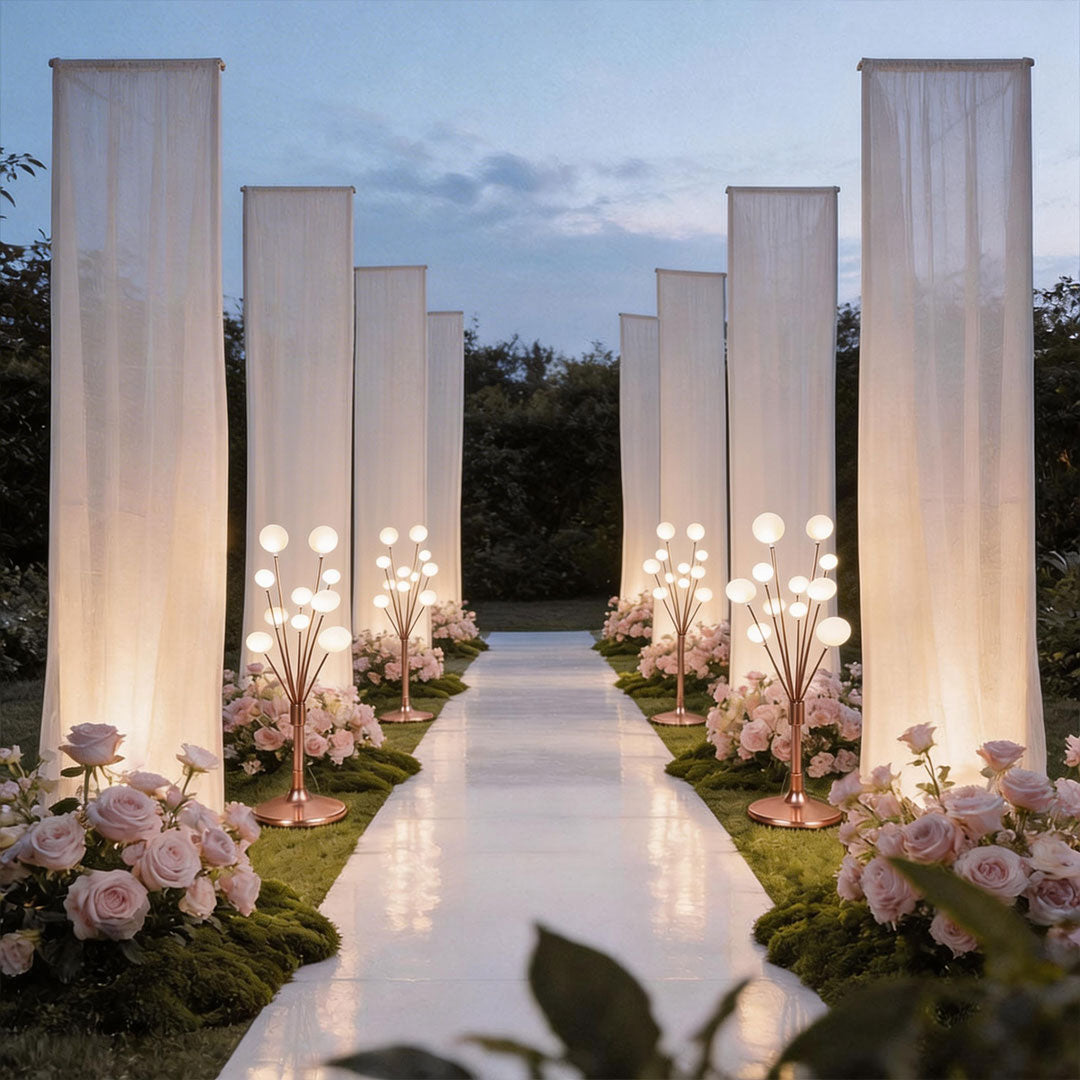 Elegant multi-branch floor lamp decor with white globe bulbs for an outdoor wedding aisle setup