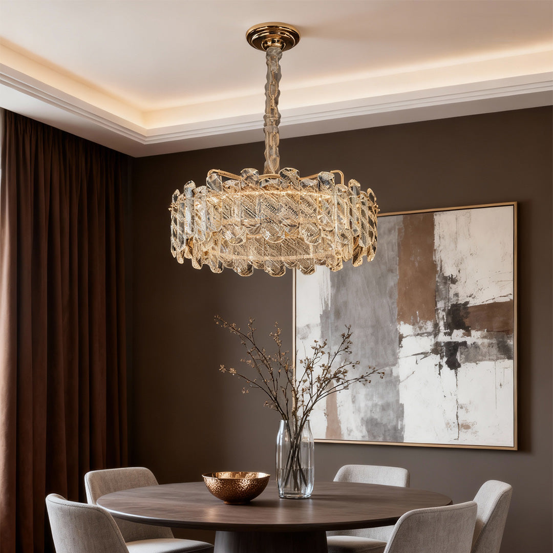 Elegant nordic chandelier featuring glass shade chandelier aesthetic illuminating warm dining space with abstract art and dark wood accents.