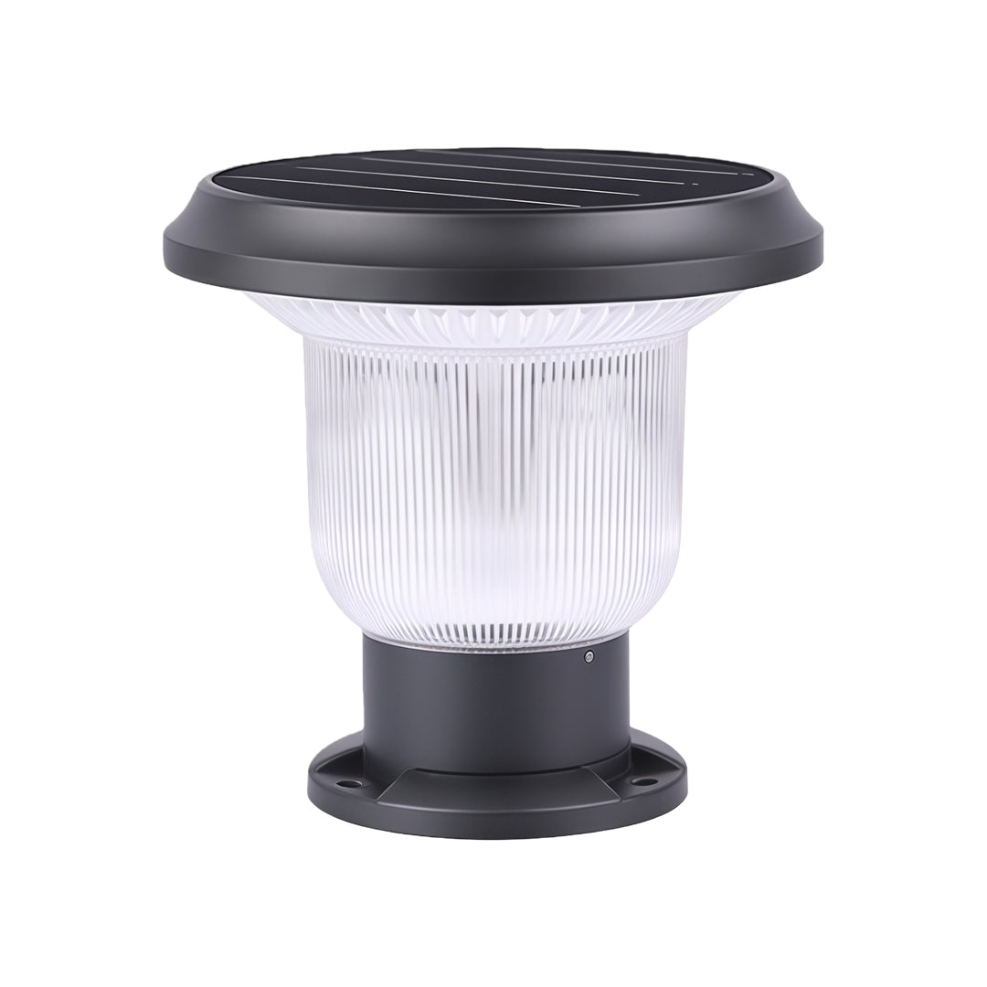 Elegant outdoor pillar light illuminating a modern fence, adding ambiance to the yard.