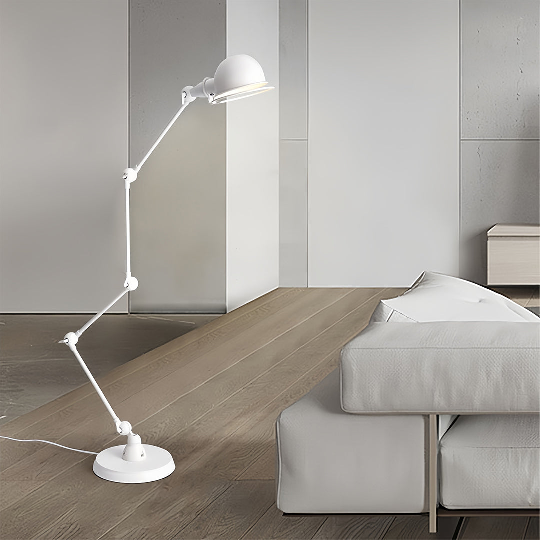 Elegant reading floor lamp for living room with white finish beside neutral sofa and minimalist decor