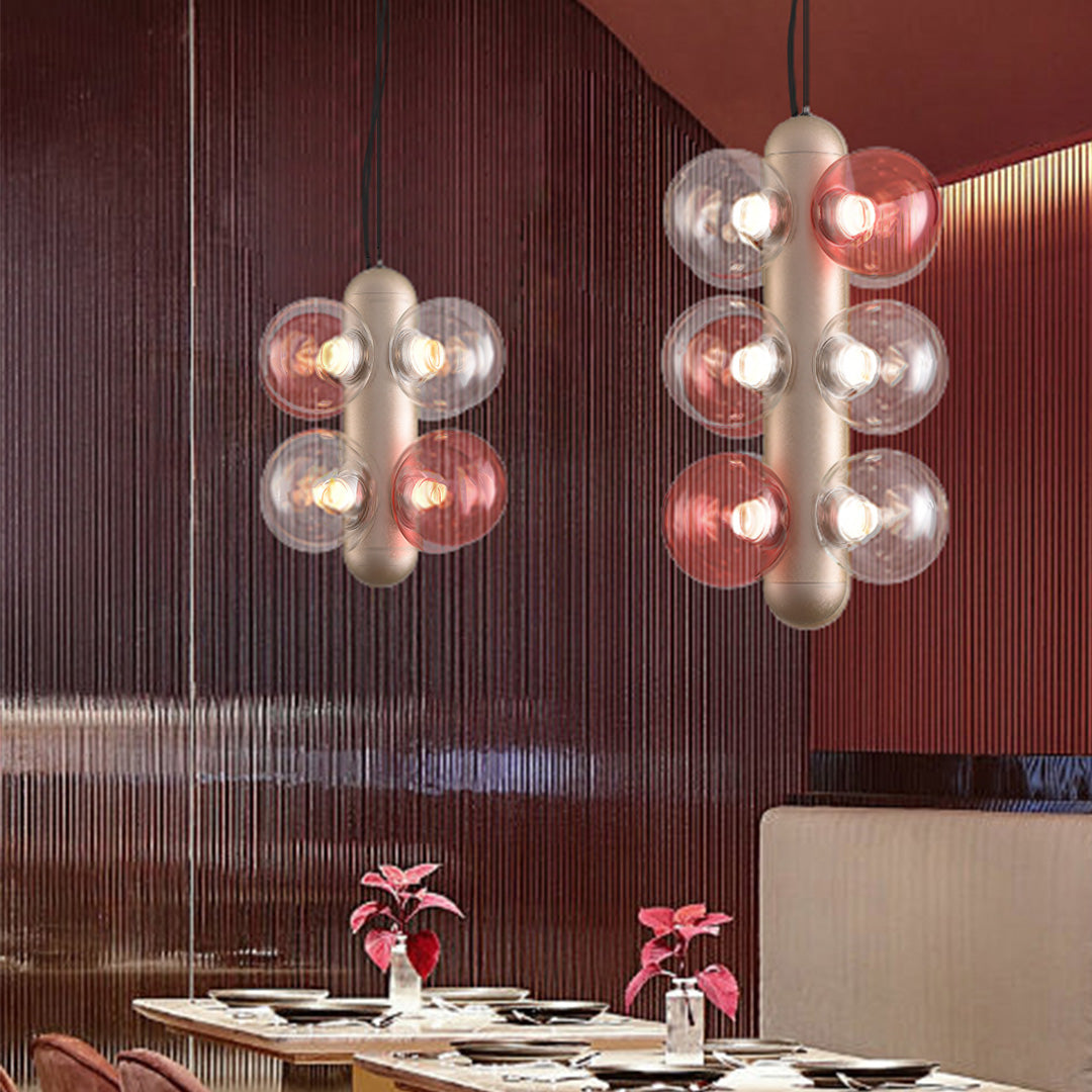 Elegant restaurant lighting with cluster pendant fixtures creating warm ambient dining atmosphere