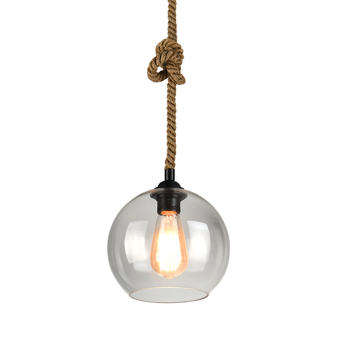 Elegant retro glass pendant light with smoky gray globe perfect for modern industrial decor.