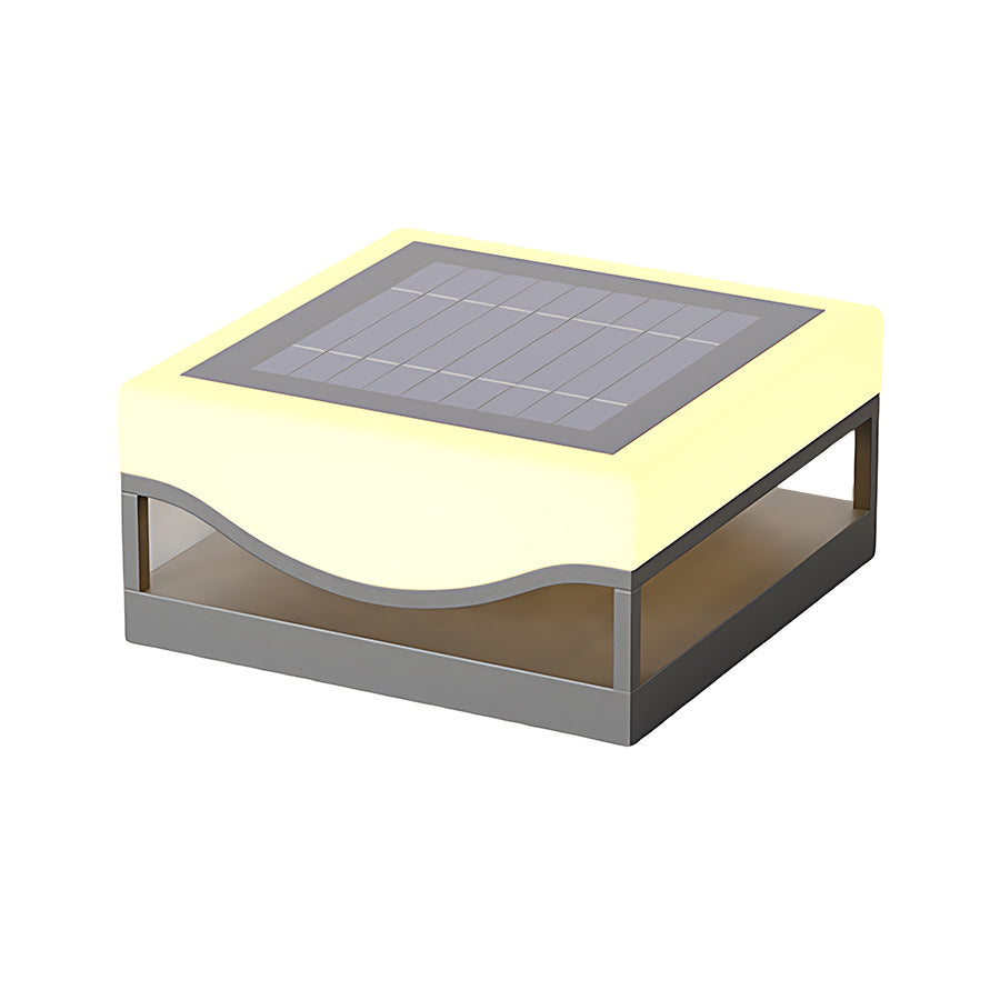 Elegant solar light installation on architectural element with warm evening glow