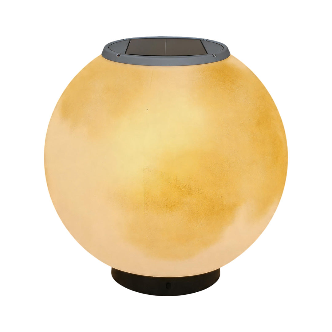 Elegant solar moon pillar lights illuminating with a soft warm glow over white backgrounds.
