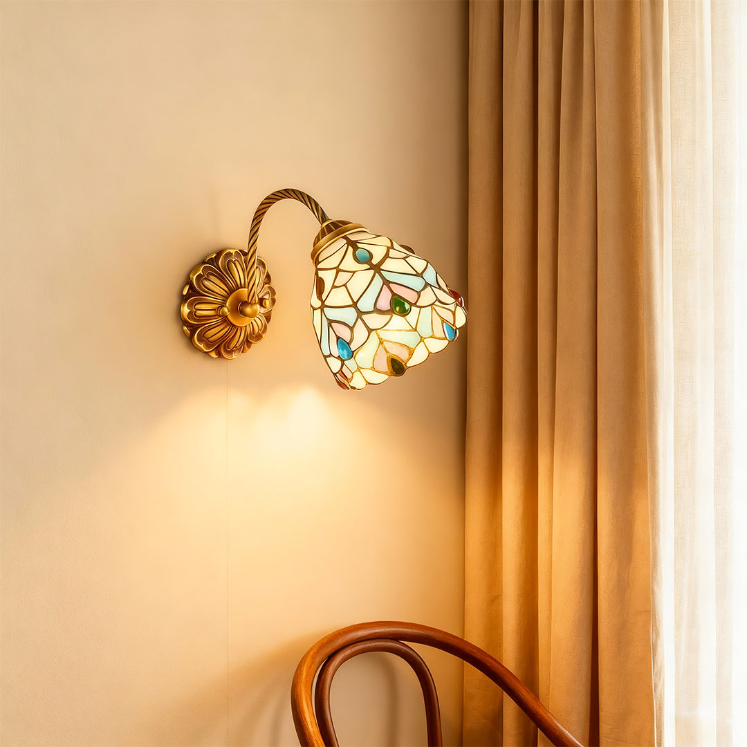 Elegant stained glass wall sconce lighting featuring glass shade chandelier design illuminating bedroom with warm ambient glow.