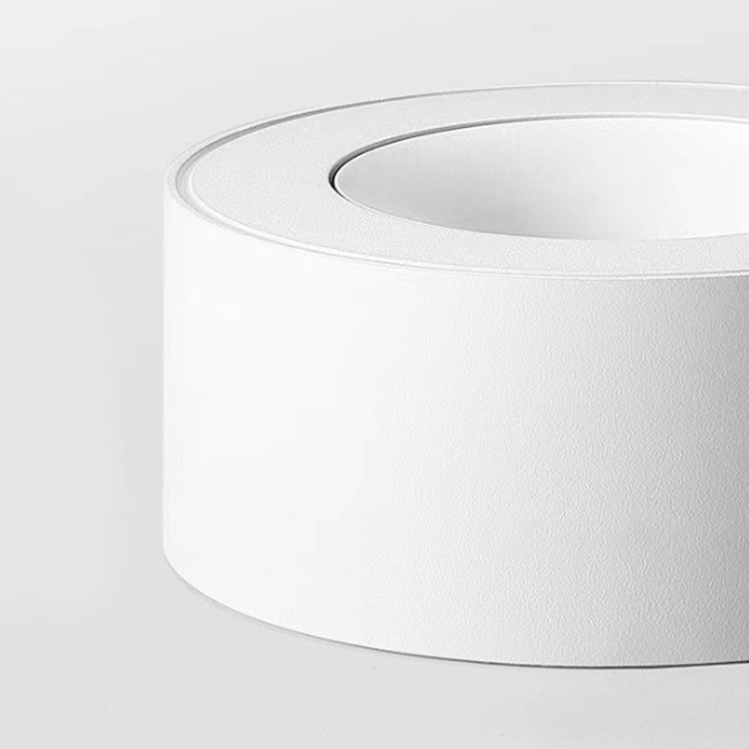 Elegant surface mounted can light with a sleek, cylindrical shape and soft light output.
