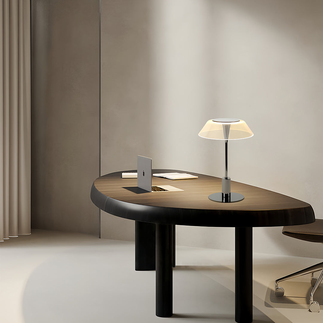 Elegant table lamp with a white translucent shade on a round table