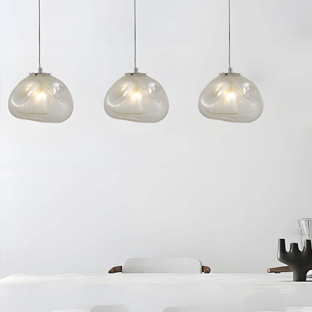 Add a sophisticated glow with this Nordic pendant light, made of hand-blown textured glass, perfect for living rooms, dining areas, or contemporary office spaces.