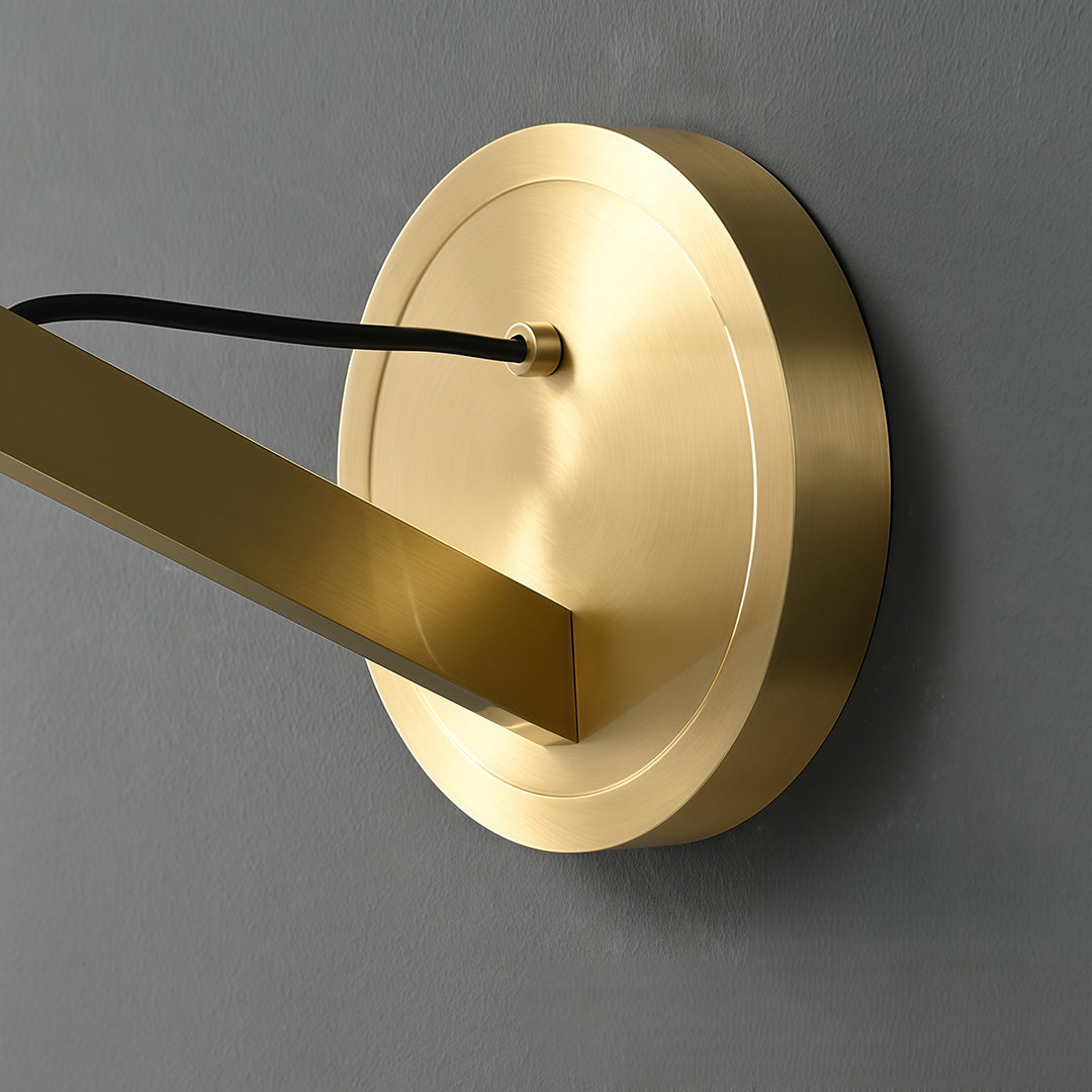 Elegant wall mount pendant light featuring glass shade chandelier design shown in detailed angled view highlighting brass construction.