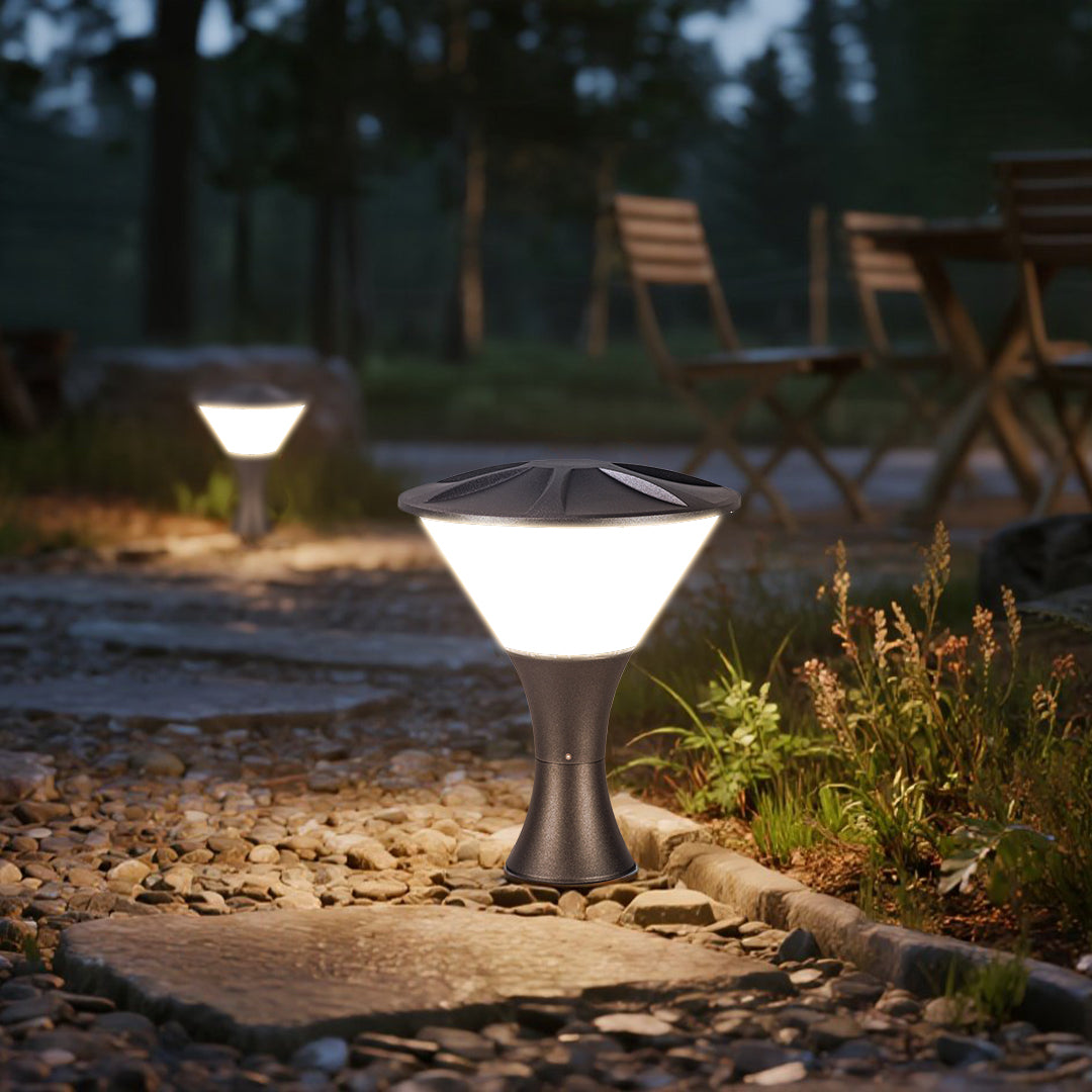 Elegant white conical bollard light creating warm ambiance in residential garden landscape setting
