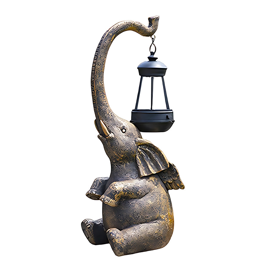 Decorative elephant-shaped garden lantern holder with curved trunk supporting hanging lantern in bronze finish