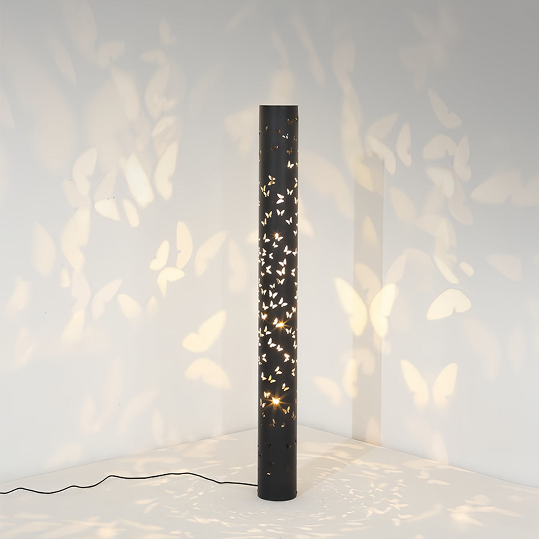 Stylish small black pendant light illuminating modern space with enchanting butterfly patterns