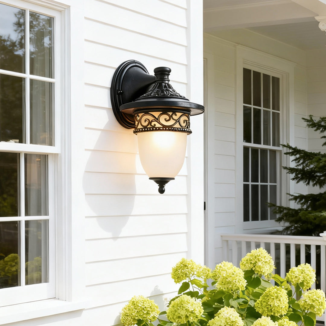 Vintage wall lights outdoor with black metal finish installed near entry walkway.