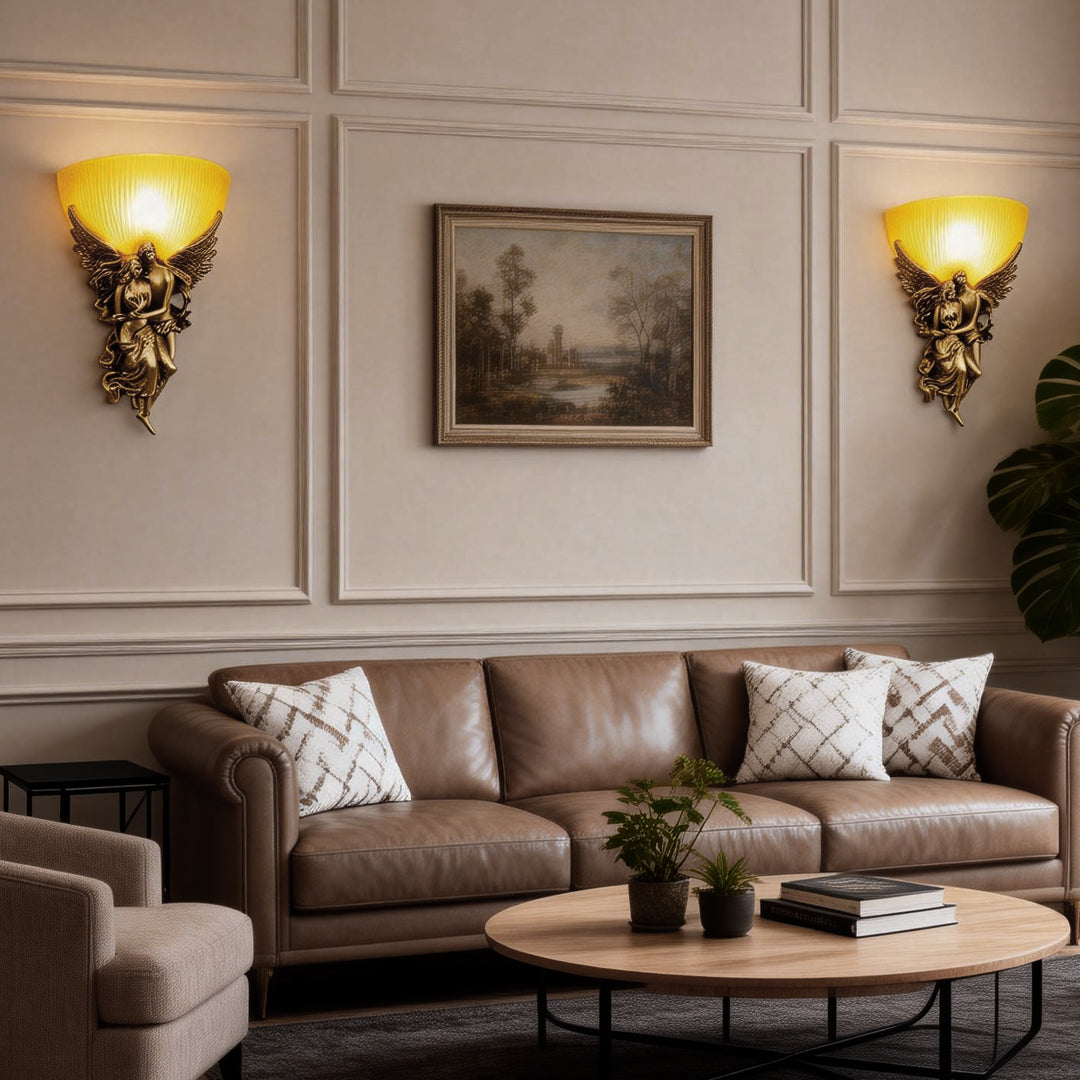 European angel wall sconce illuminating a cozy seating area with a sofa and framed artwork.