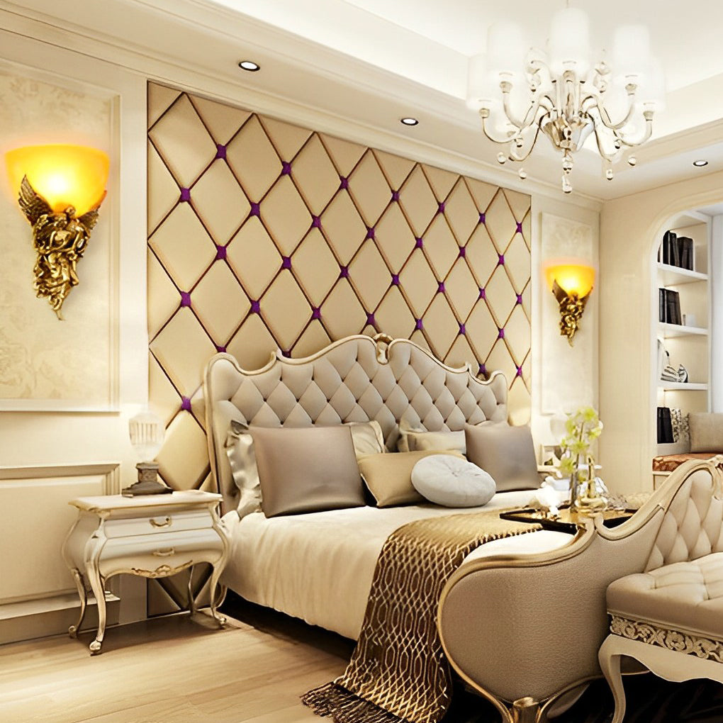 Luxurious European angel wall sconce in a bedroom with tufted headboard and soft lighting.