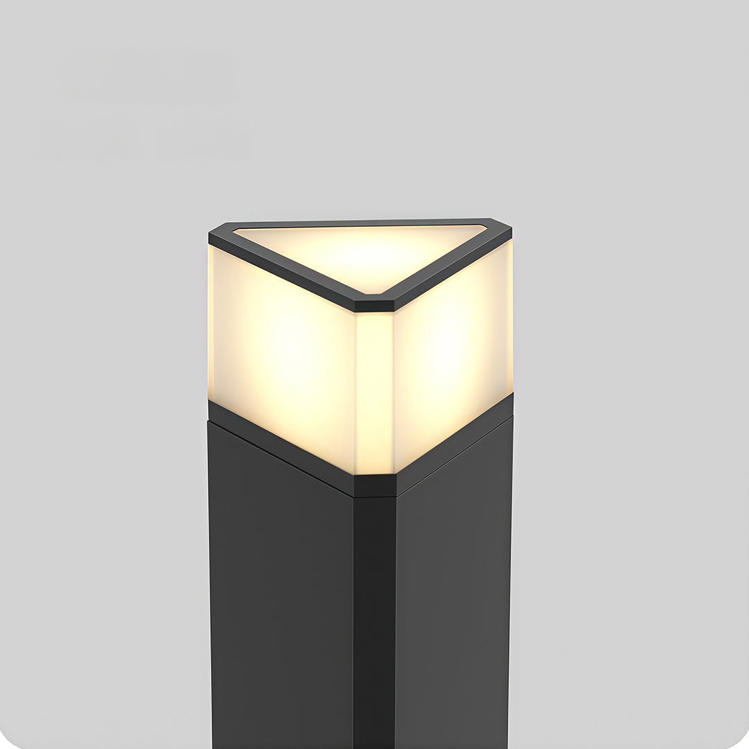 Exterior pathway light installed along a wooden deck, providing warm and inviting illumination.