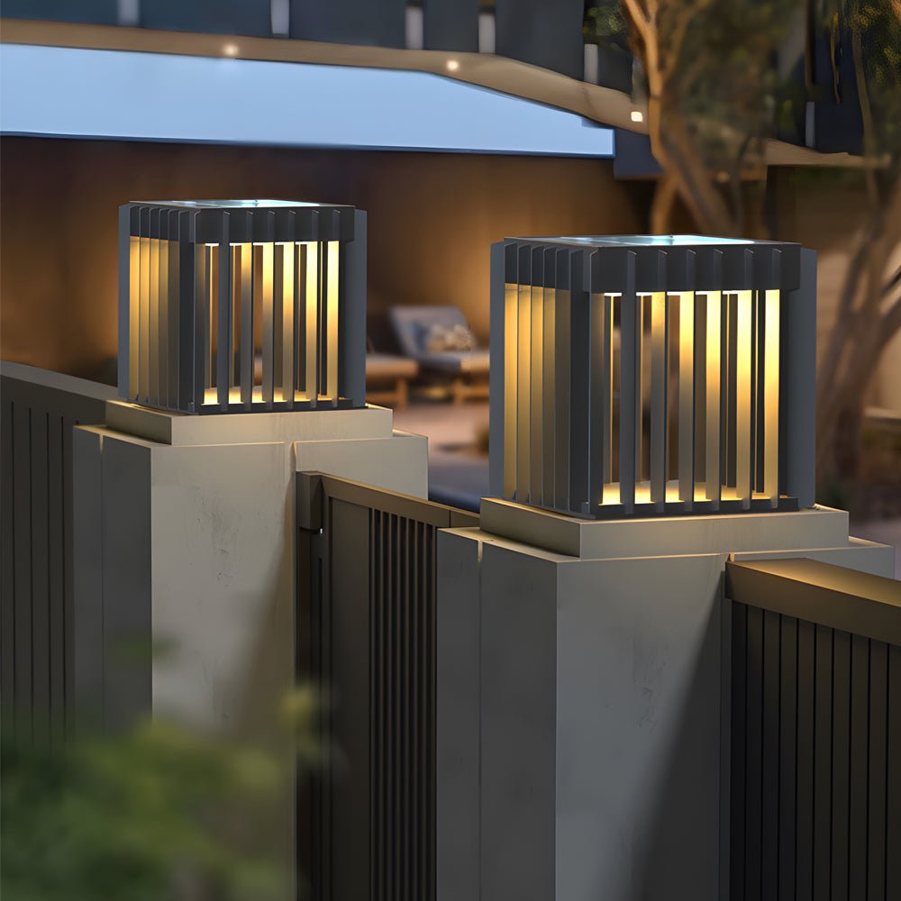 Exterior pillar lights with a close-up view of their sleek, geometric design.