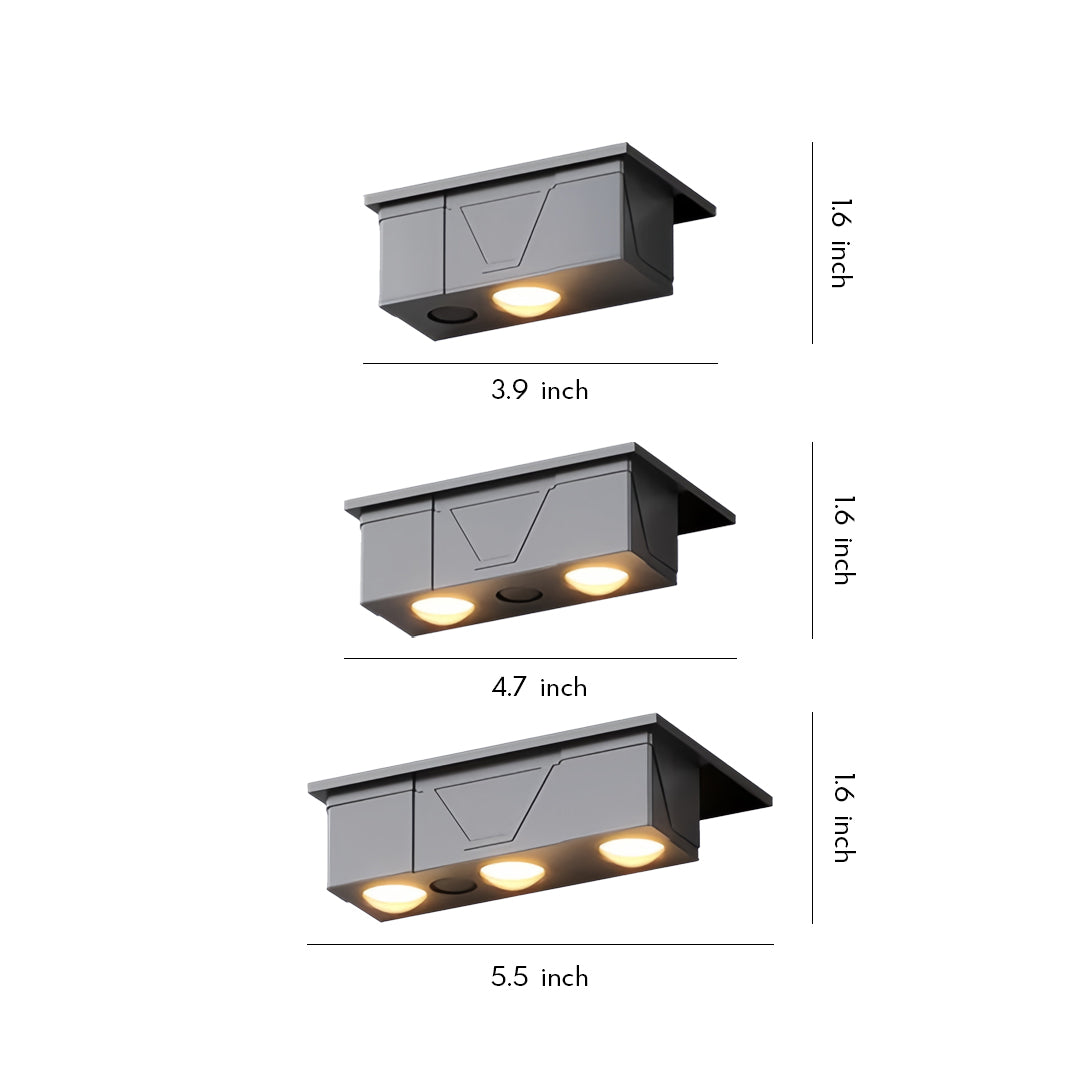 Compact rectangular exterior wall wash lighting fixture with triple-head design for wide, even illumination.