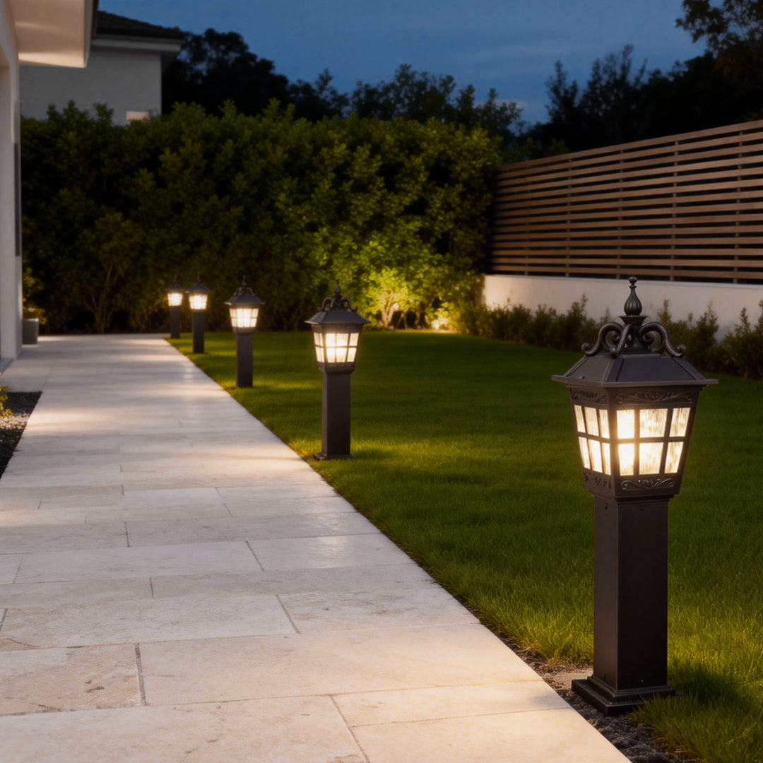 external-post-lights-garden-pathway-lush-greenery-paved-stones