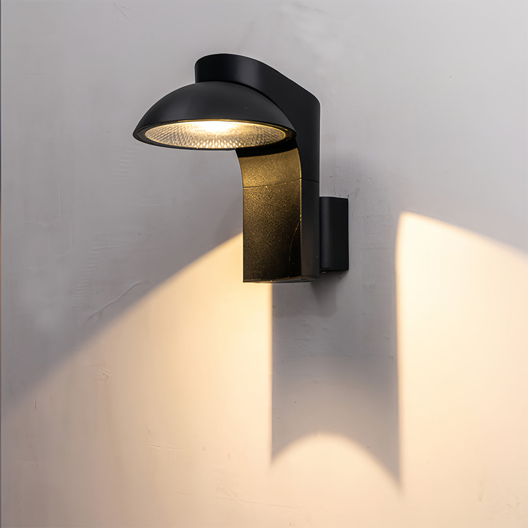 Oversized extra large outdoor wall light with rectangular body and soft warm beam.