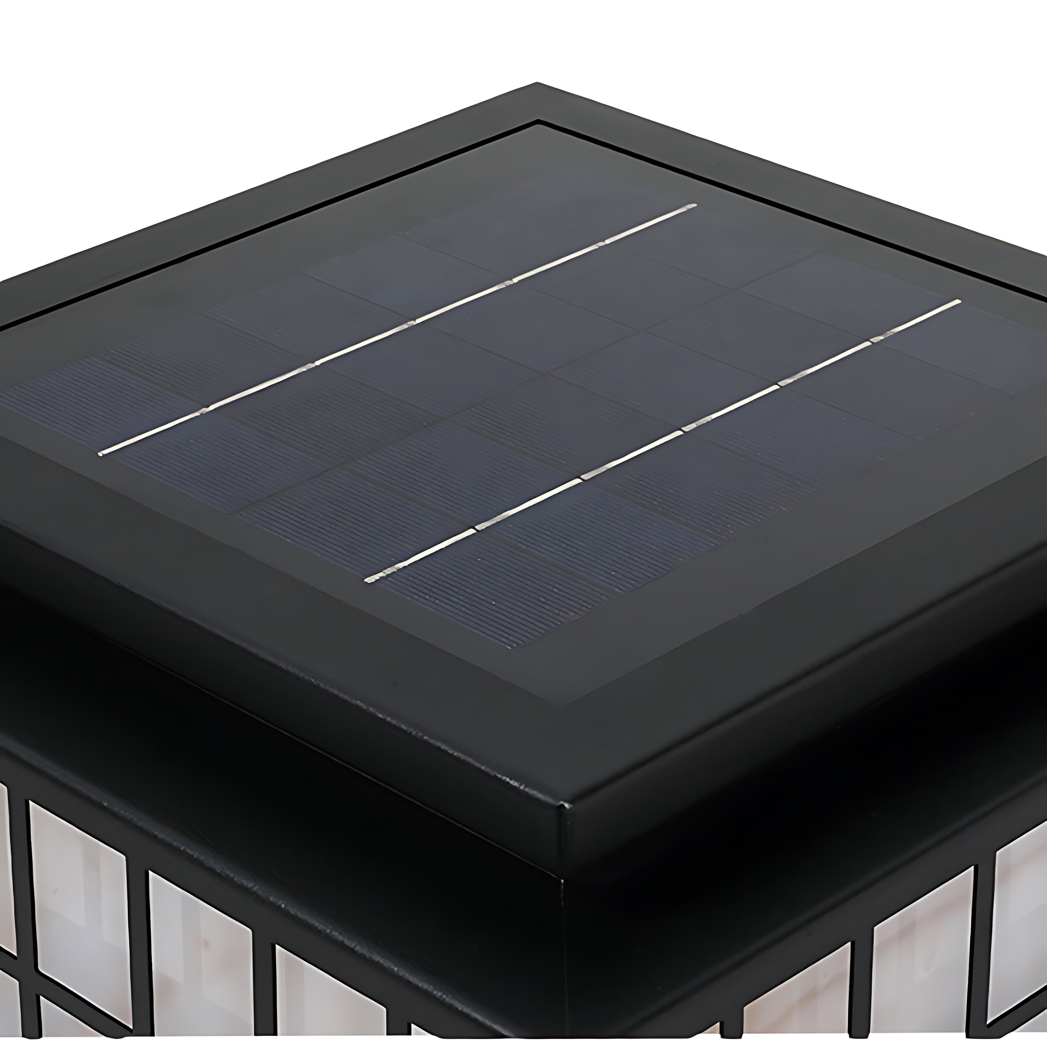 Japanese-style solar lanterns placed on stone surface creating peaceful zen garden atmosphere with natural rock elements