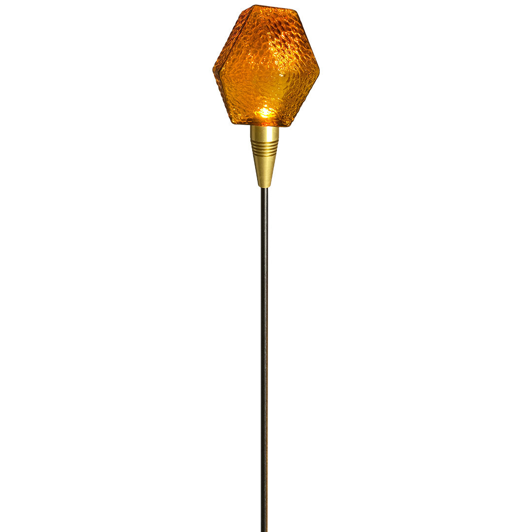 Gold faceted globe garden stake offering a radiant glow suitable for decorative landscape lighting pathway.