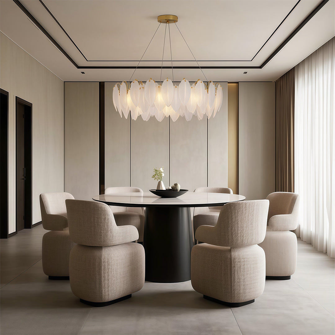 Modern luxury chandeliers illuminating cozy dining area with dark wood furniture