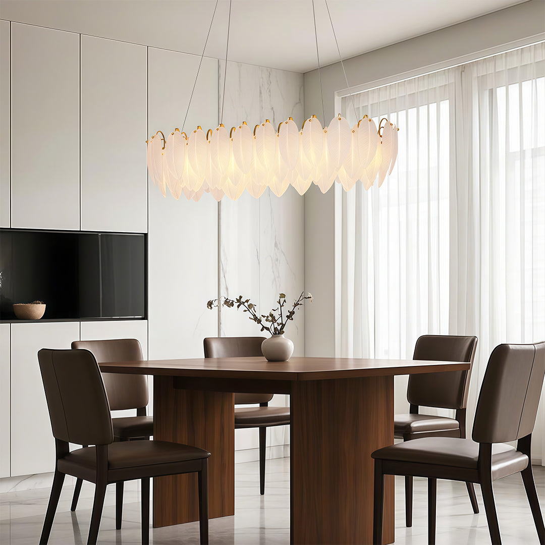 Modern luxury chandeliers creating dramatic effect in contemporary dining space