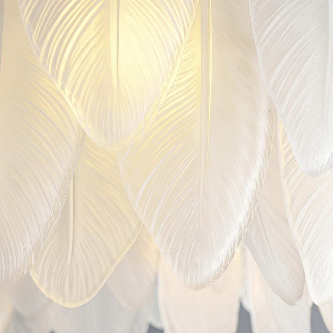 Feathers chandelier illuminating spacious bedroom with floor-to-ceiling windows and neutral decor