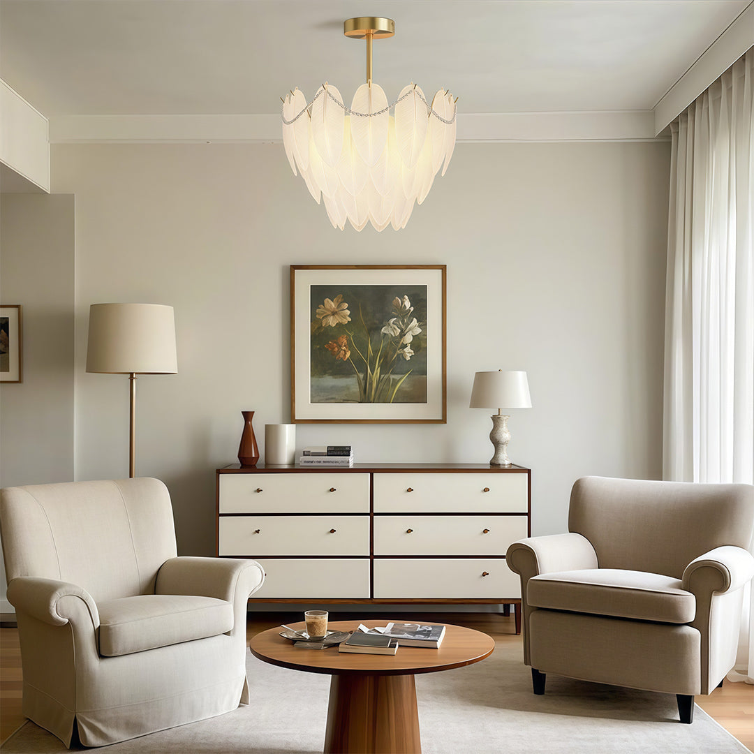 Feathers chandelier creating warm glow in transitional living room with traditional elements