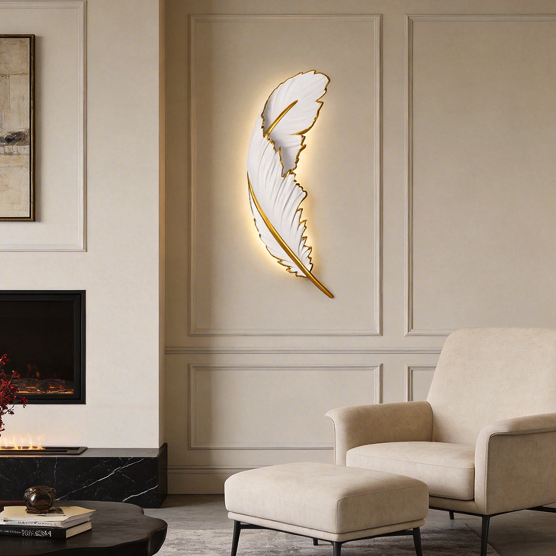 Feather LED wall lamp with a golden outline, providing elegant illumination in a modern living room.