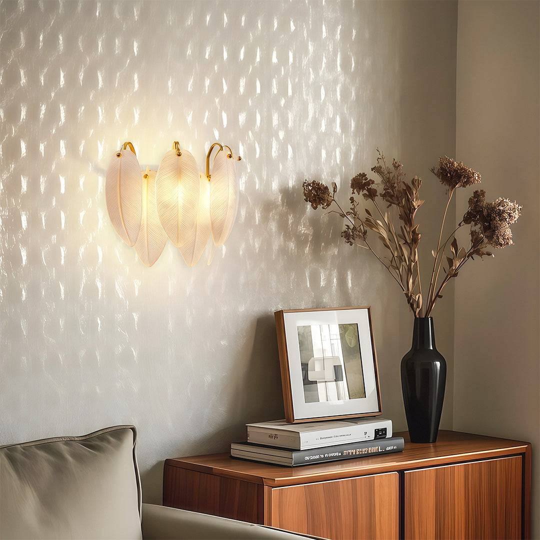 Feather wall light creating ambient glow in cozy bedroom corner with textured wall panels