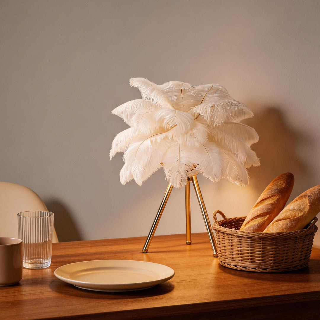 Feather table lamp with a white feather design, placed on a dining table.