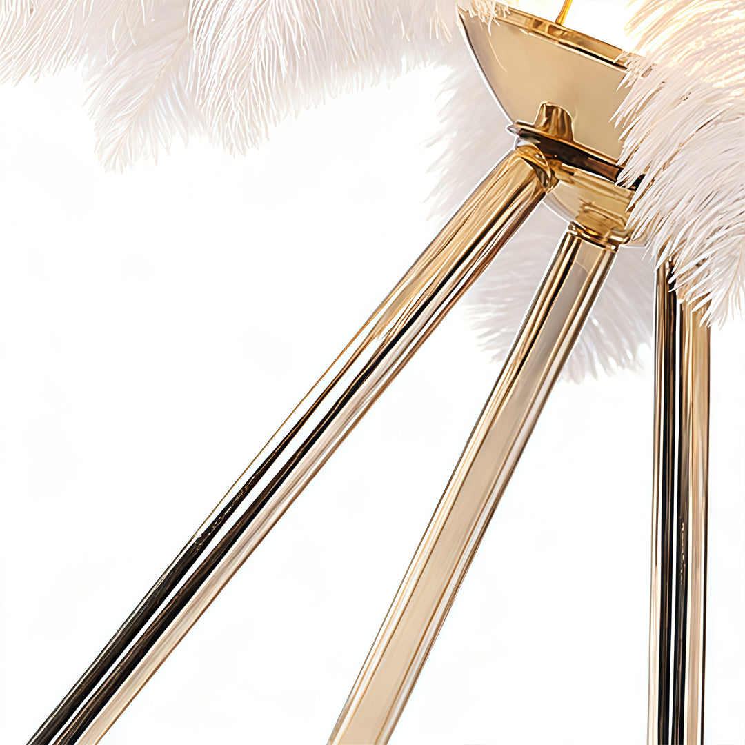 Feather table lamp with a white feather design, providing soft illumination.
