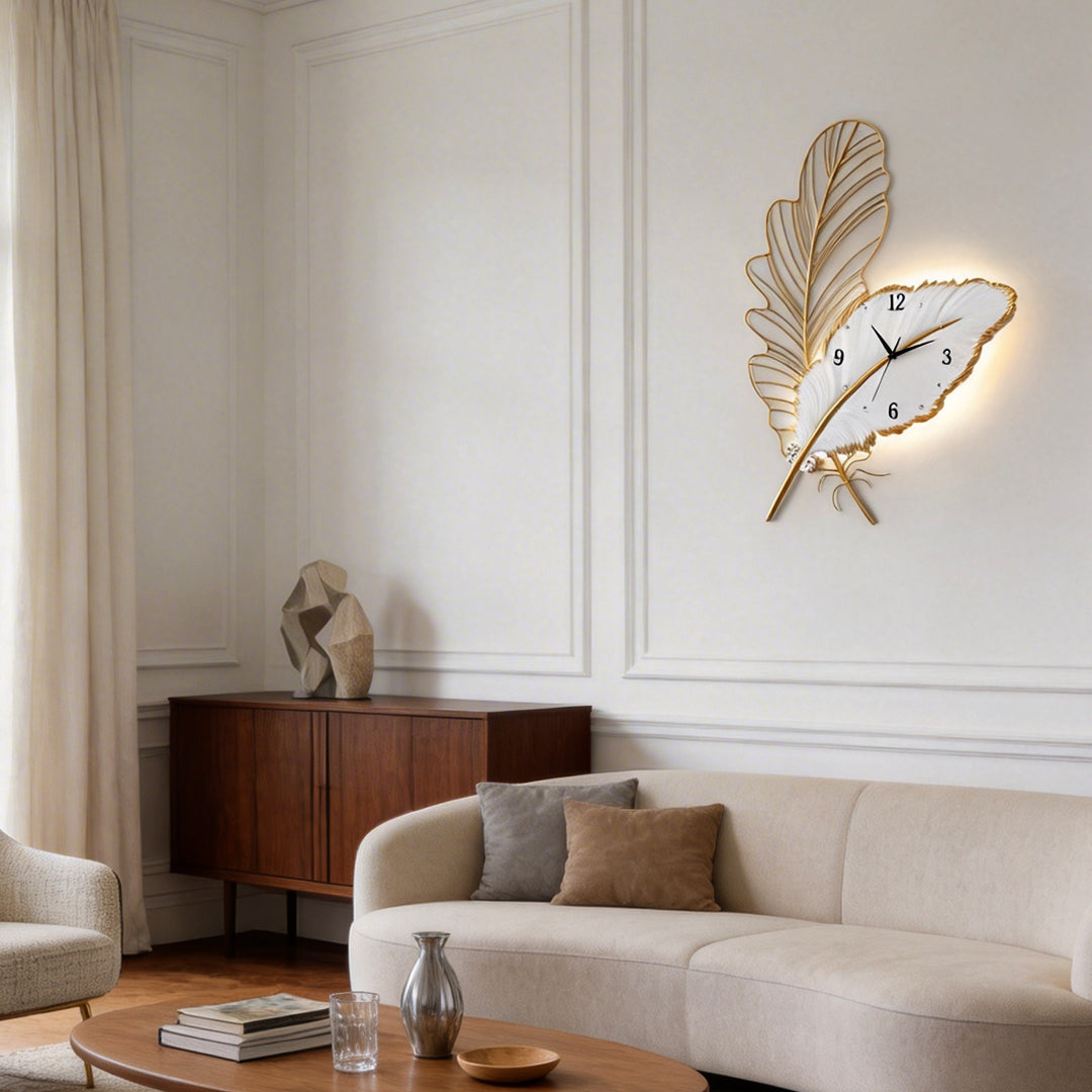 Feather wall clock enhancing a contemporary interior with stylish metallic accents.