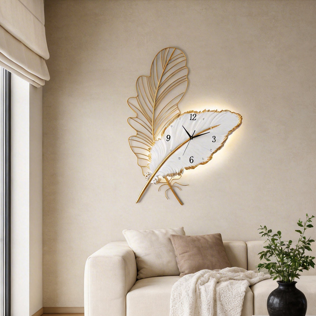Feather wall clock with elegant golden design mounted in a modern living room.