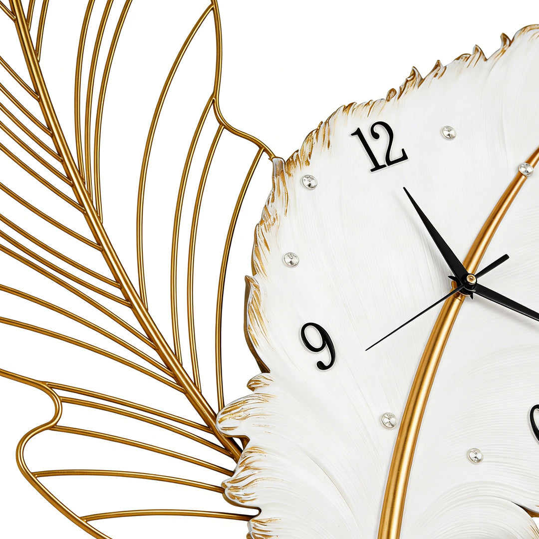 Feather wall clock with side view showing depth and decorative elements.