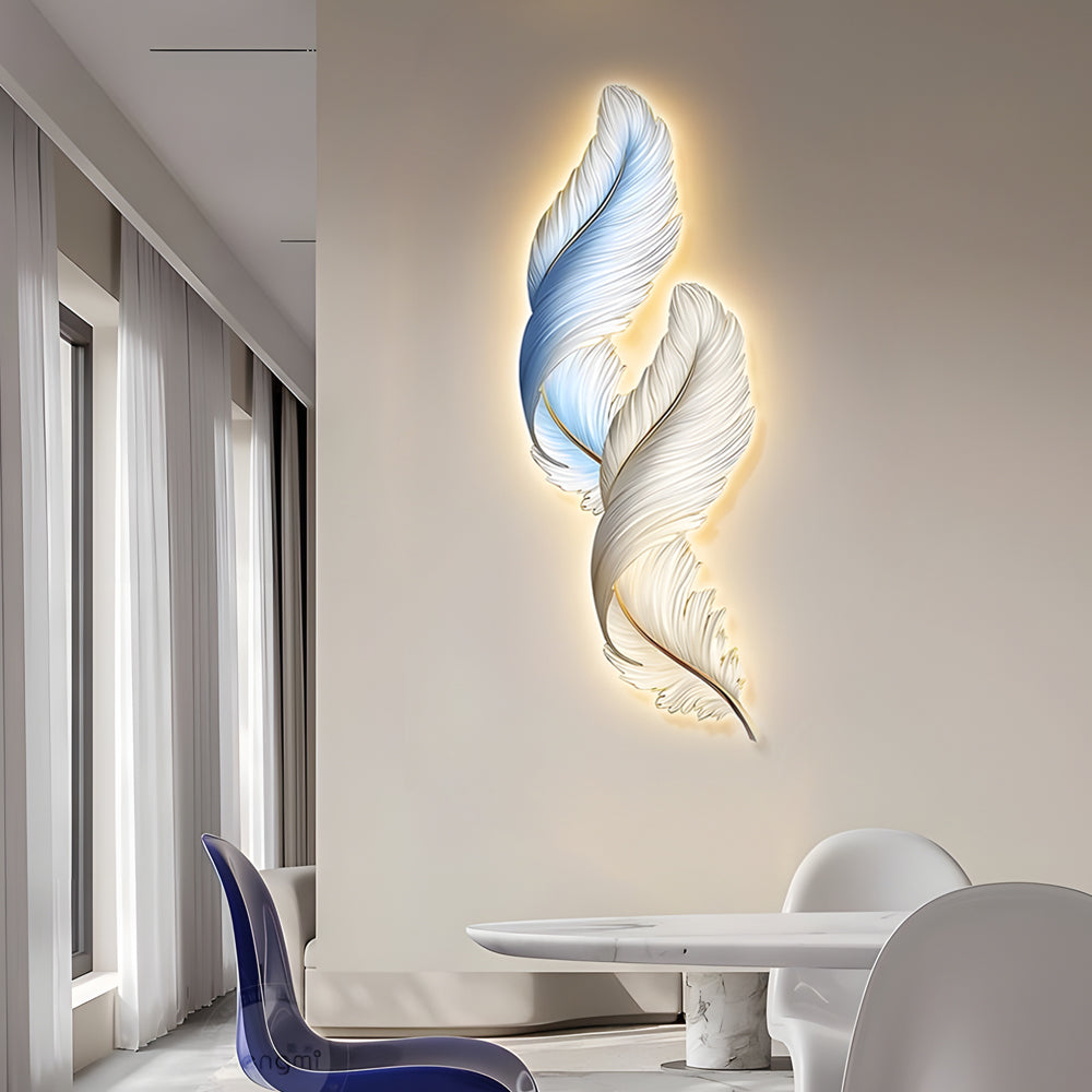 Feather wall decor light shown in a minimalist room, emphasizing sculptural texture and ambient LED lighting.