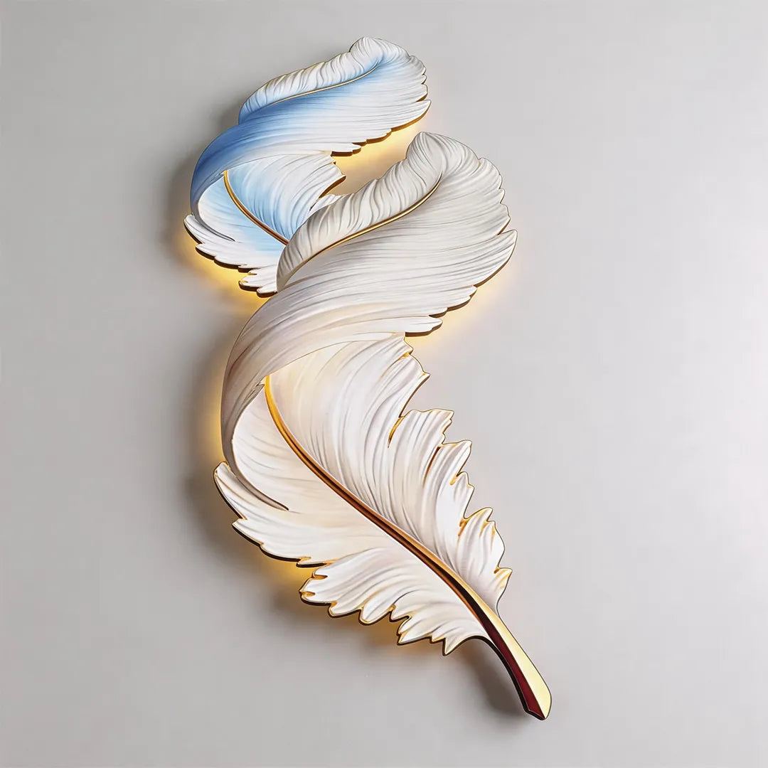 Illuminated feather wall decor light with sculpted white layers and warm backlighting.