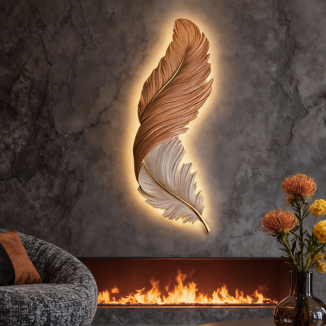 Artistic feather wall lamp glowing above a modern fireplace wall