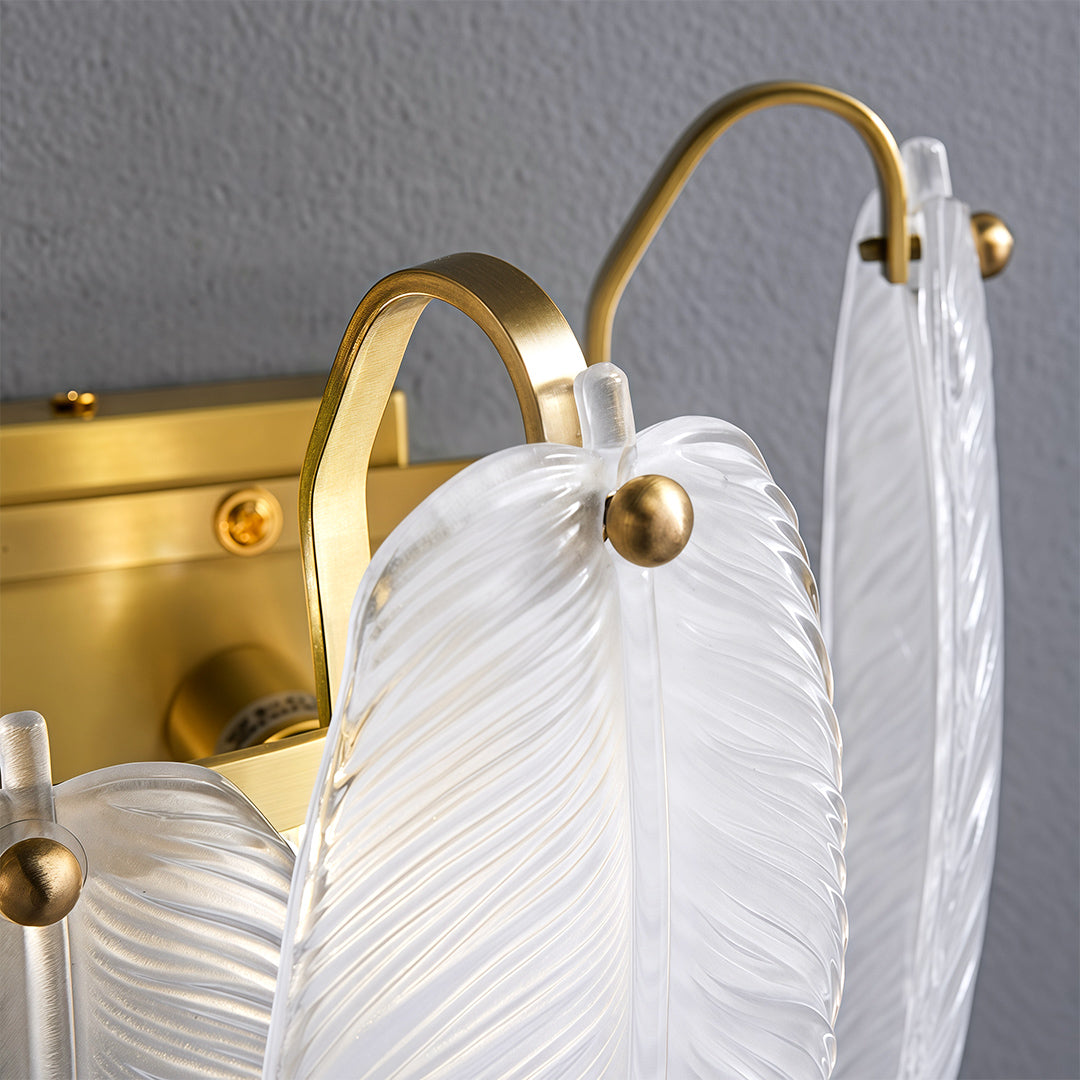 Modern luxury chandeliers style feather wall light close-up showcasing brass arms and glass detail