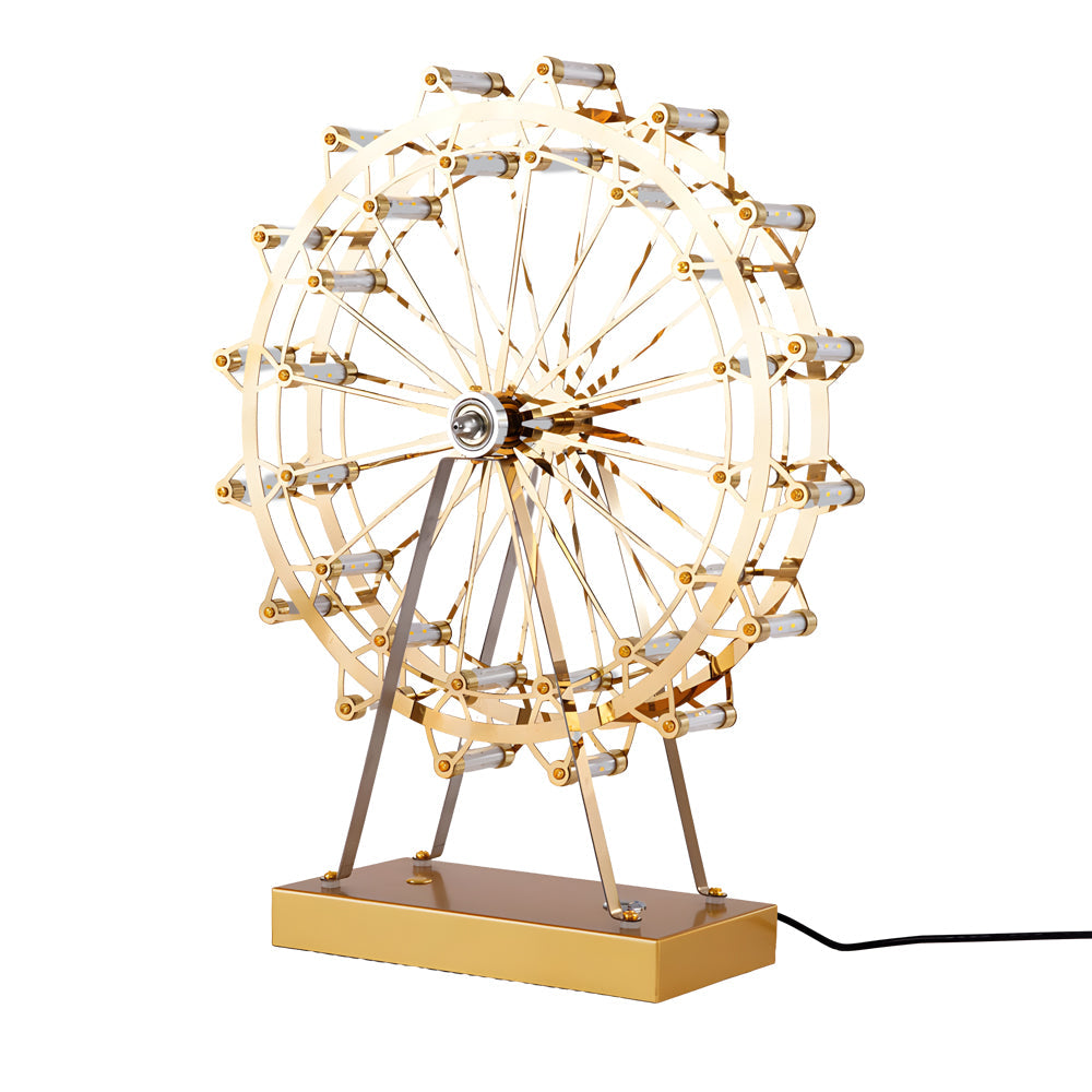 Ferris wheel lights in gold, side view of the decorative design.