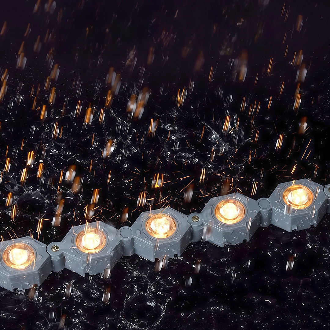 Festive DIY wall wash lighting with glass shade chandelier styling in outdoor pathway configuration with warm ambient glow.