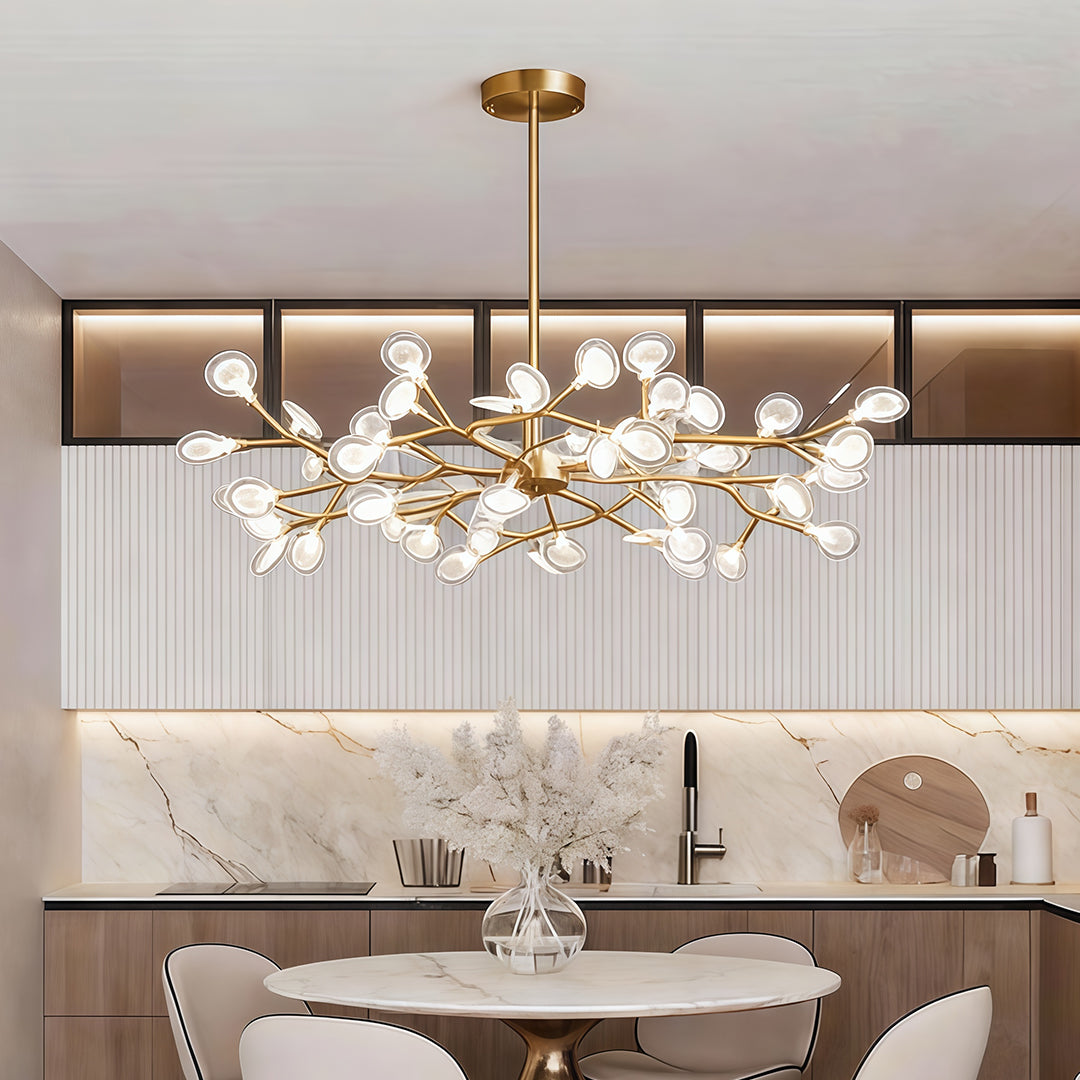 Firefly pendant light over dining table in modern kitchen setting.