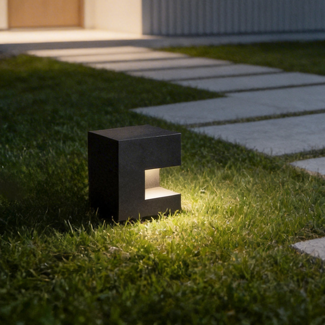 Floor light box with a close-up of its illuminated geometric structure.